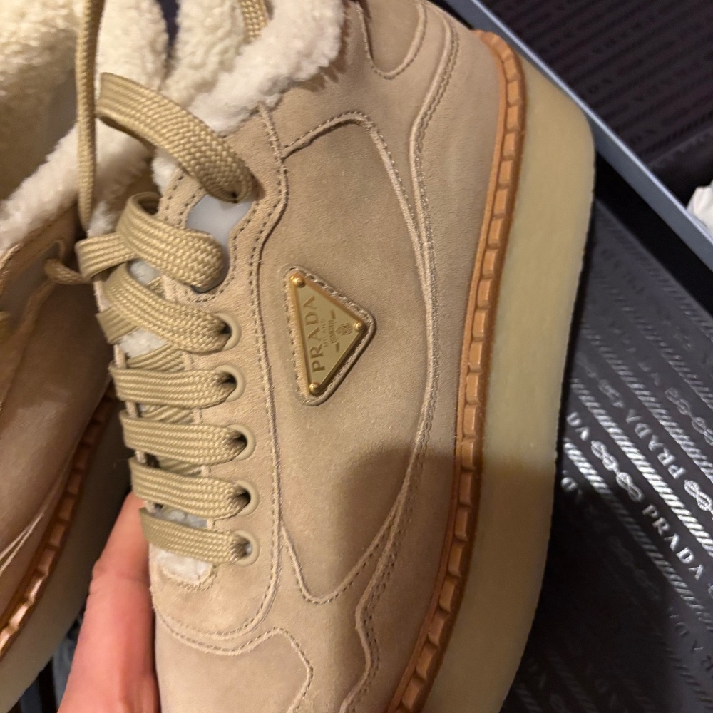 Prada Women’s mid top sneakers.